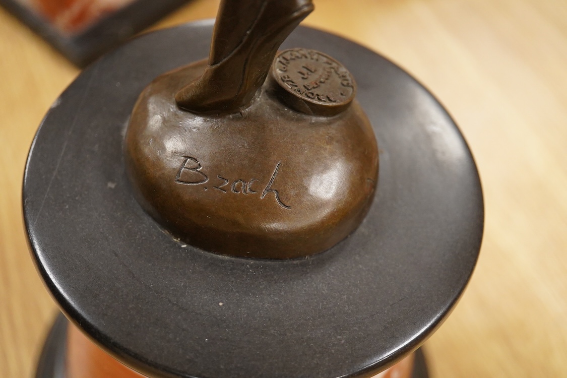 After Bruno Zach (1891-1945), an Deco style bronze of a dancing lady, raised on a marble and slate base, 65cm high